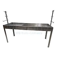 Adjustable grill rotisserie for lamb